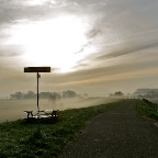 20140326 Een bemistte zonsopkomst over het dorpje dat we langzamerhand zo goed kennen.